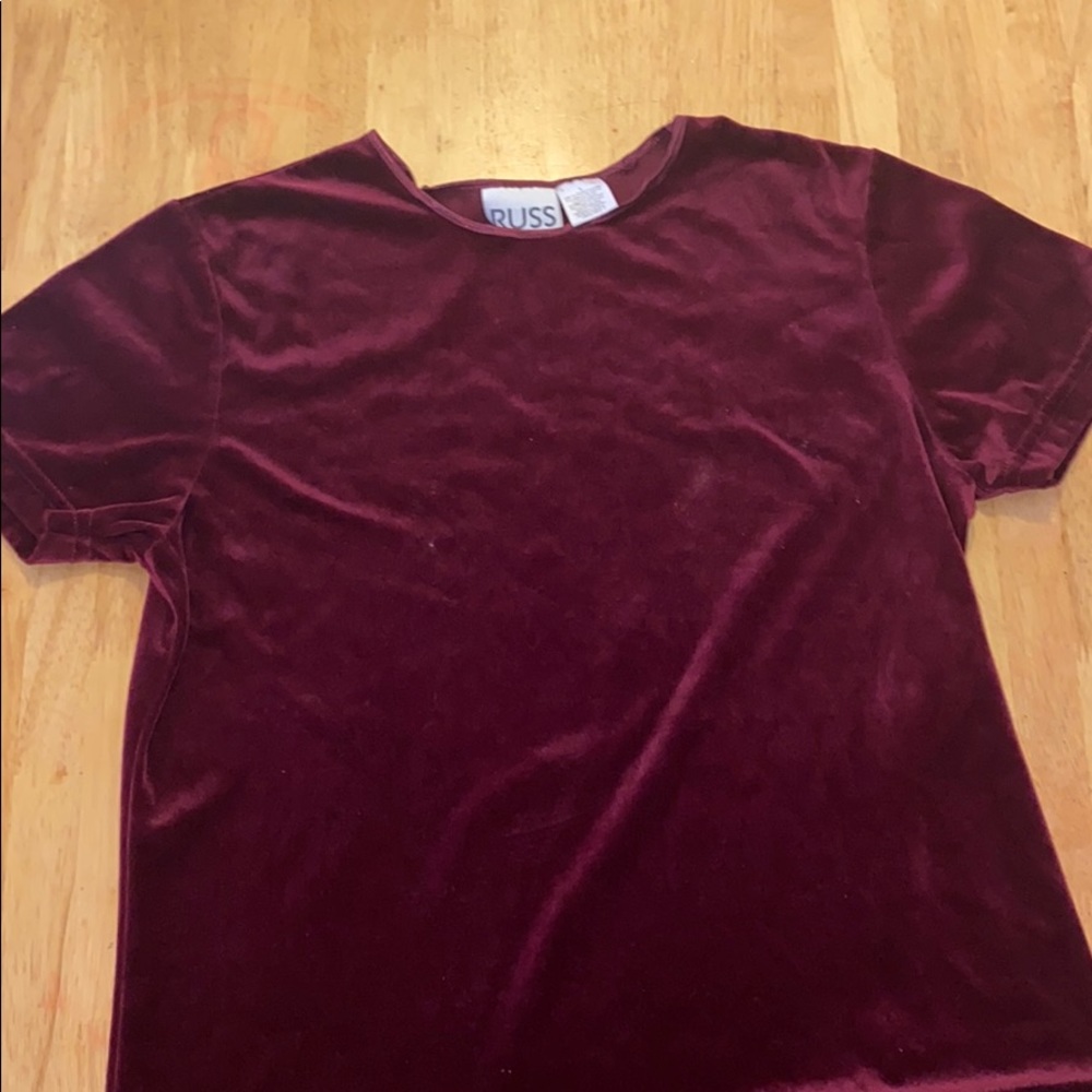 A burgundy blouse / shirt